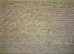 Example of a long Egyptian hieroglyphic inscription that is displayed in the Louvre.